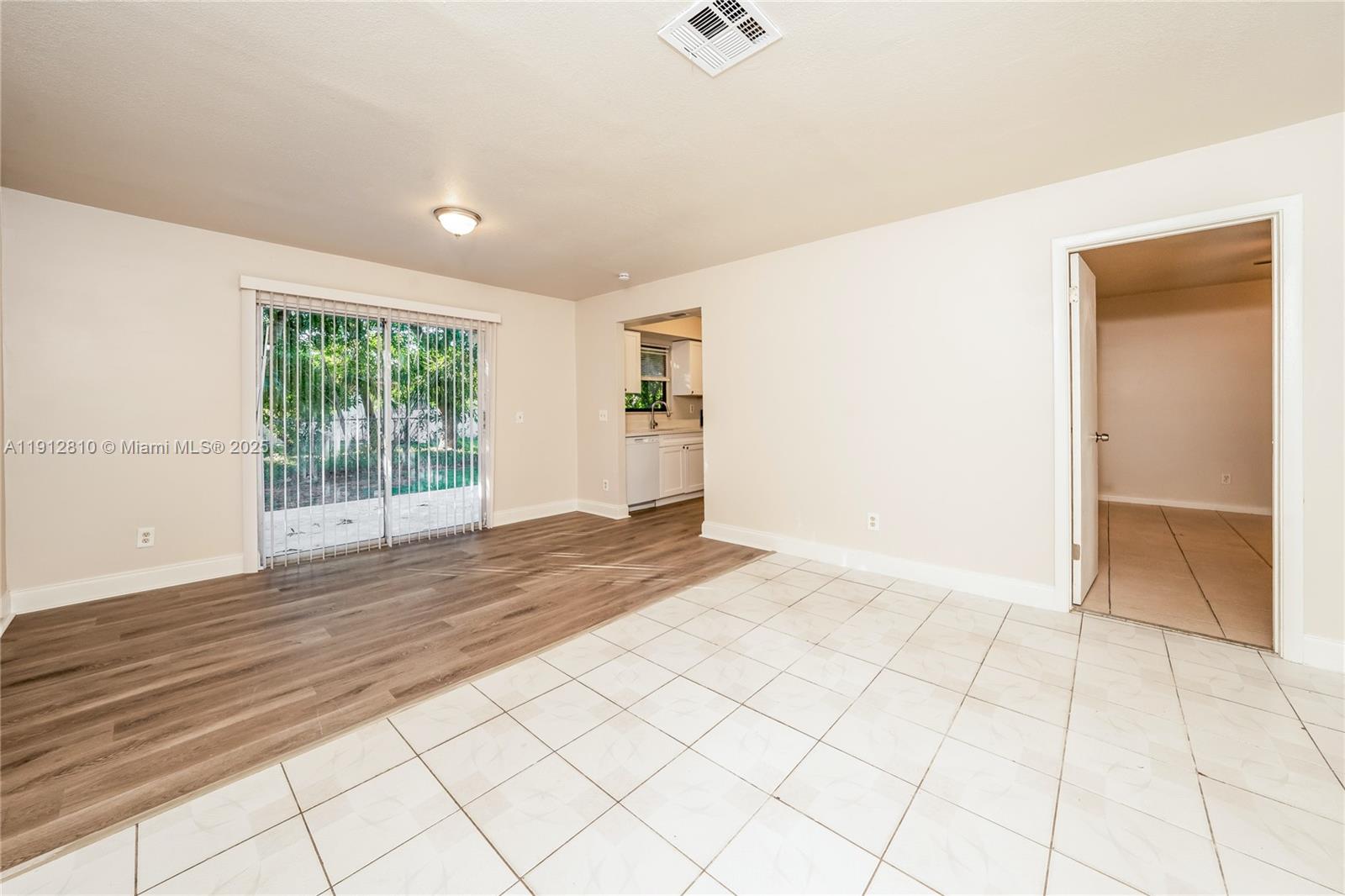 586 Udell Lane Delray Beach, FL 33445 - Photo 3 of 16 a view of an empty room and window
