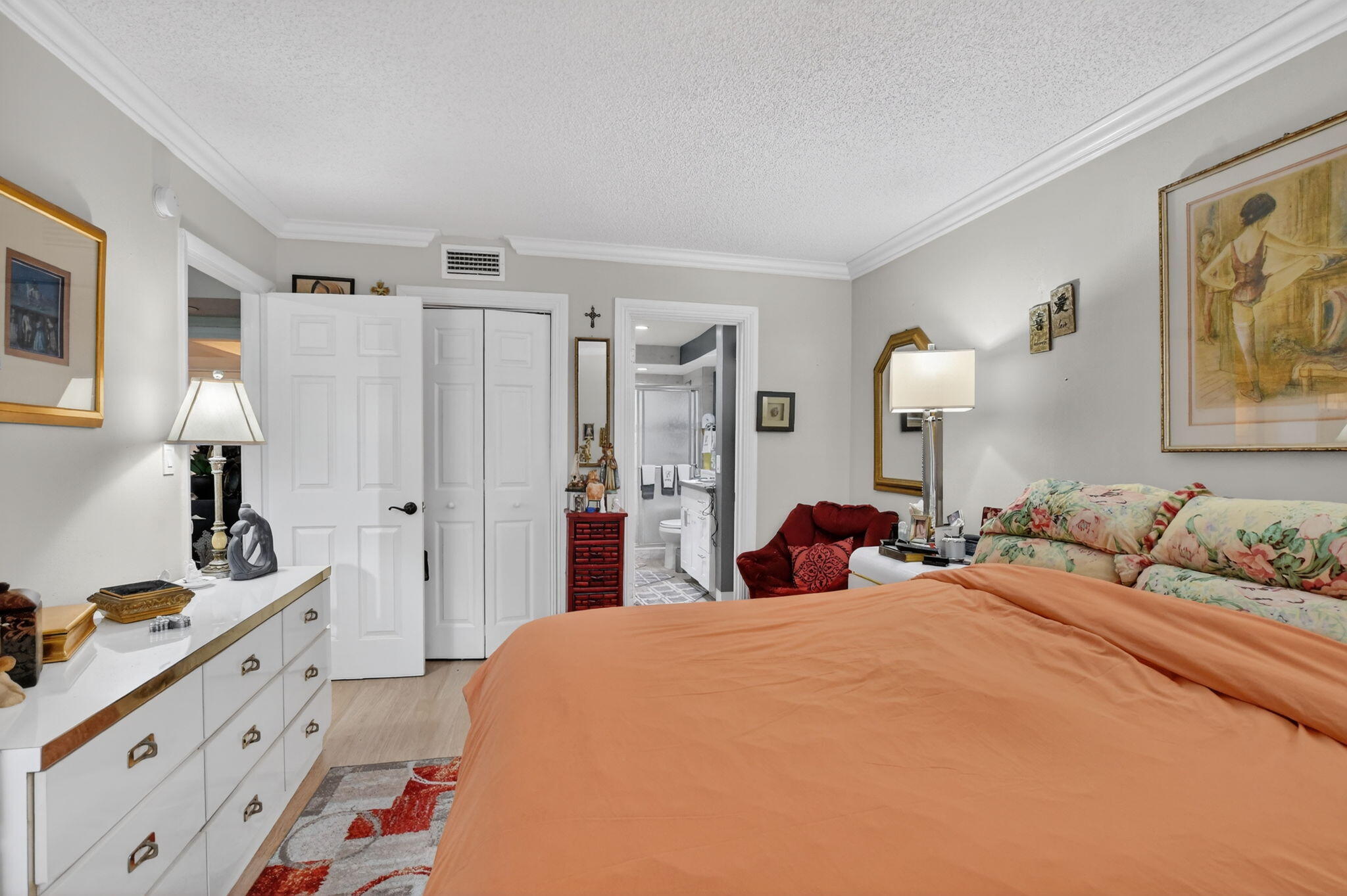 450 Northwest 20th Street, Unit 1140 Boca Raton, FL 33431 - Photo 12 of 29 a bedroom with a bed and a closet