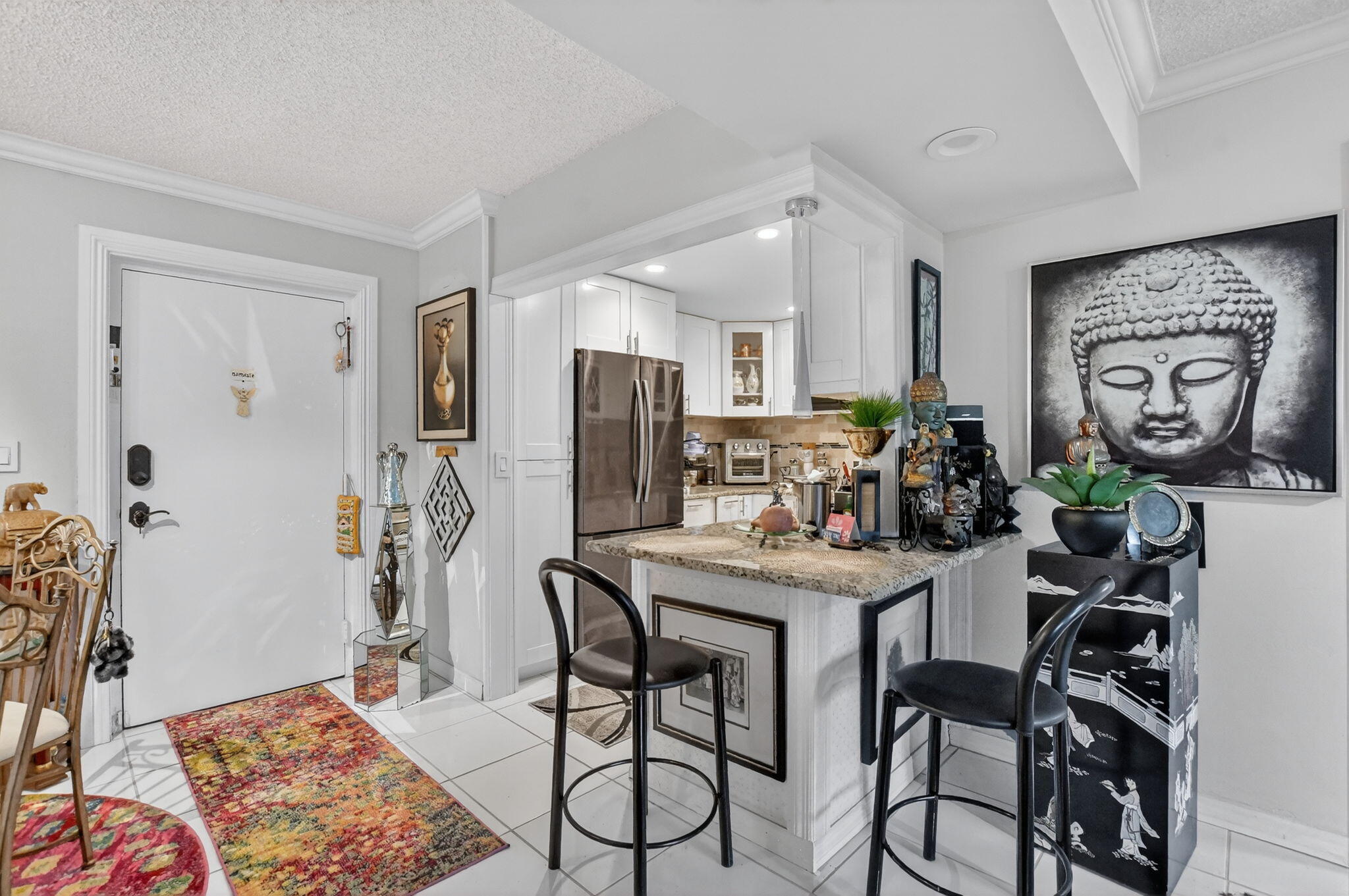 450 Northwest 20th Street, Unit 1140 Boca Raton, FL 33431 - Photo 3 of 29 a view of a dining room with furniture