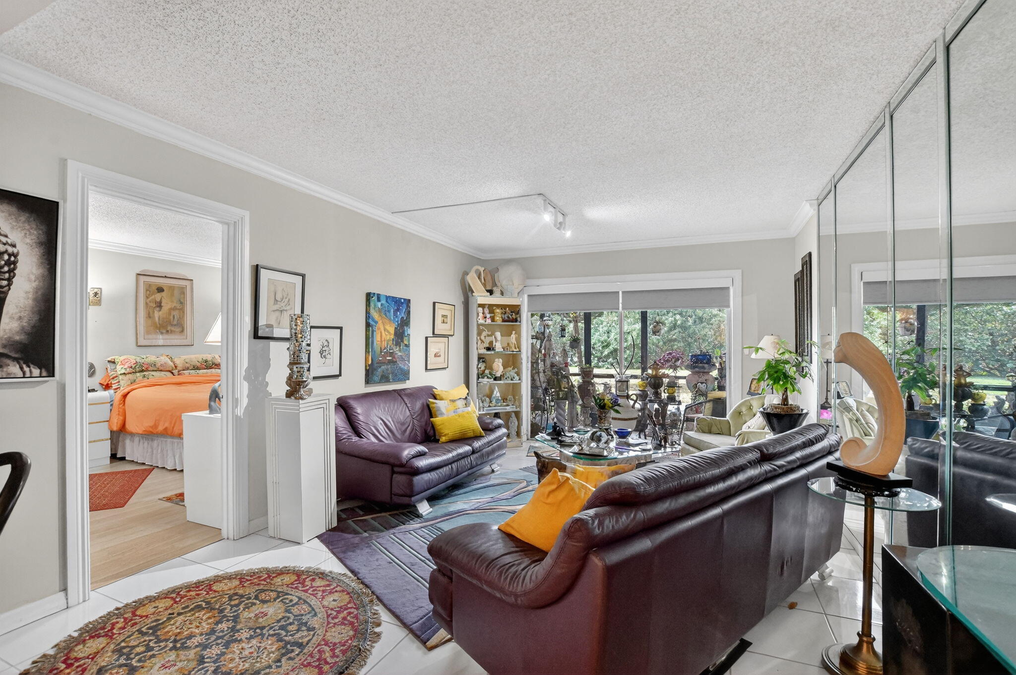 450 Northwest 20th Street, Unit 1140 Boca Raton, FL 33431 - Photo 7 of 29 a living room with furniture and a large window