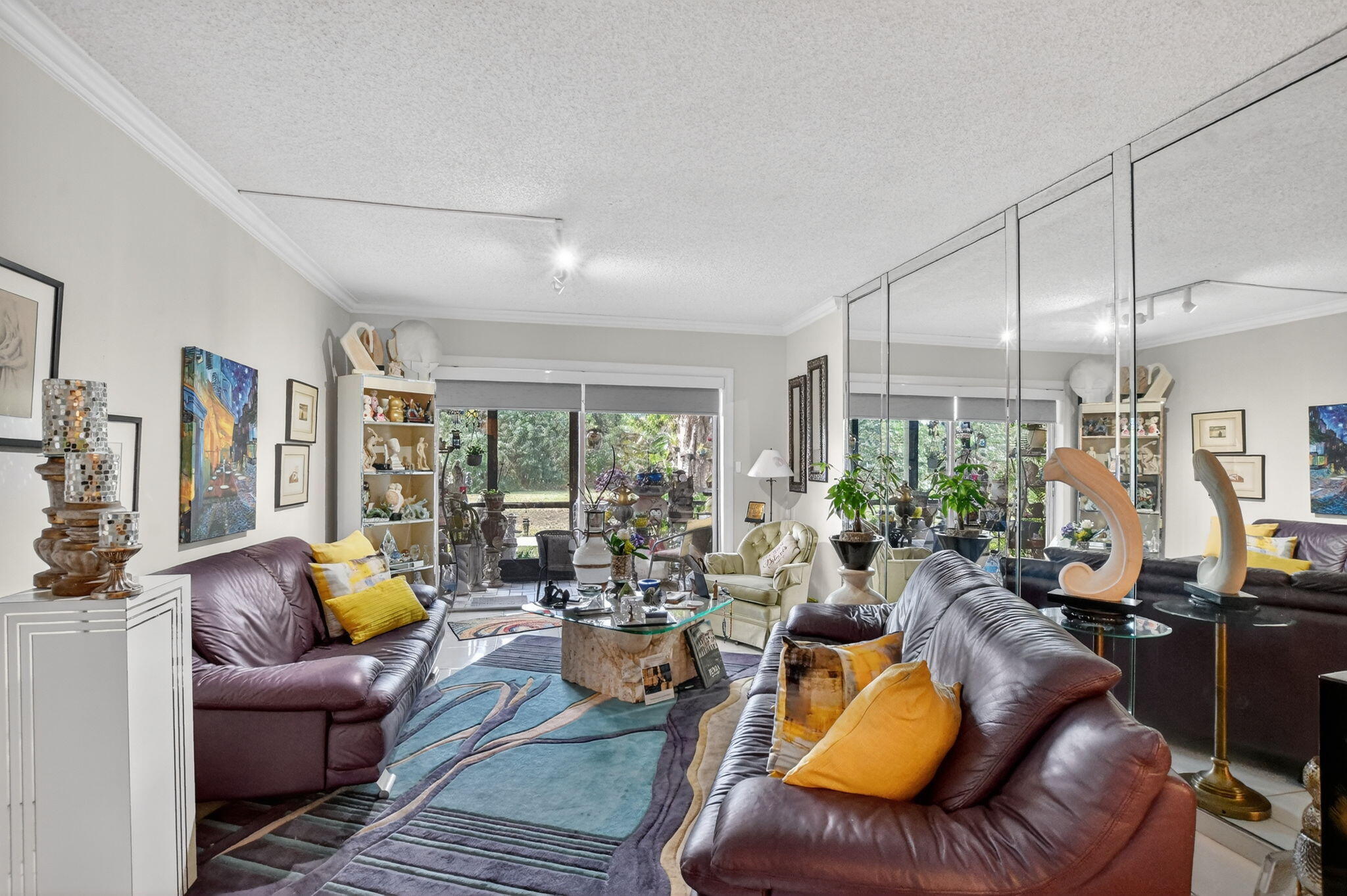 450 Northwest 20th Street, Unit 1140 Boca Raton, FL 33431 - Photo 8 of 29 a living room with furniture kitchen view and a large window