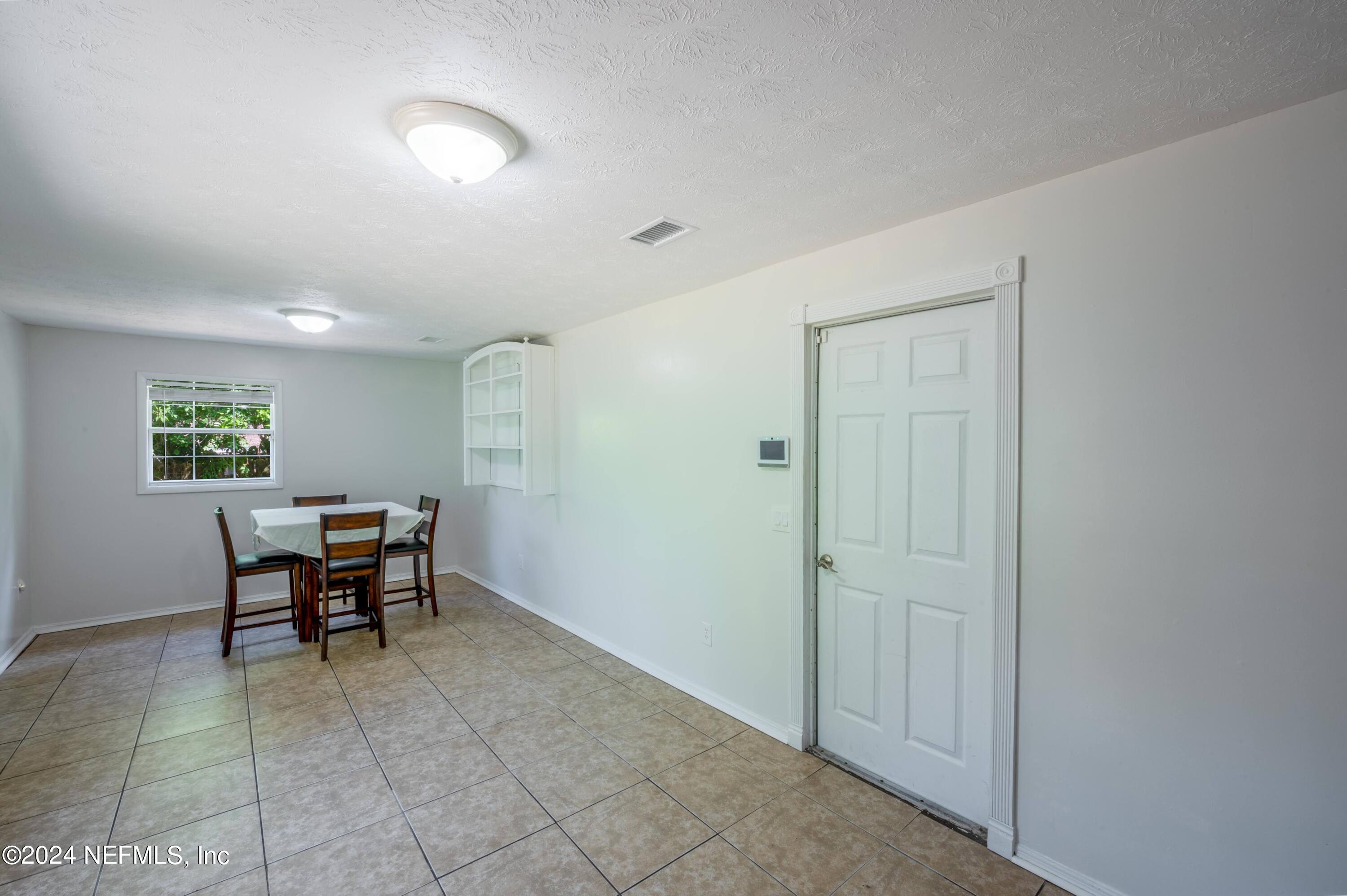 351 Capella Road Orange Park, FL 32073 - Photo 11 of 26 2024_07_08 351 Capella Rd-046-dining roo