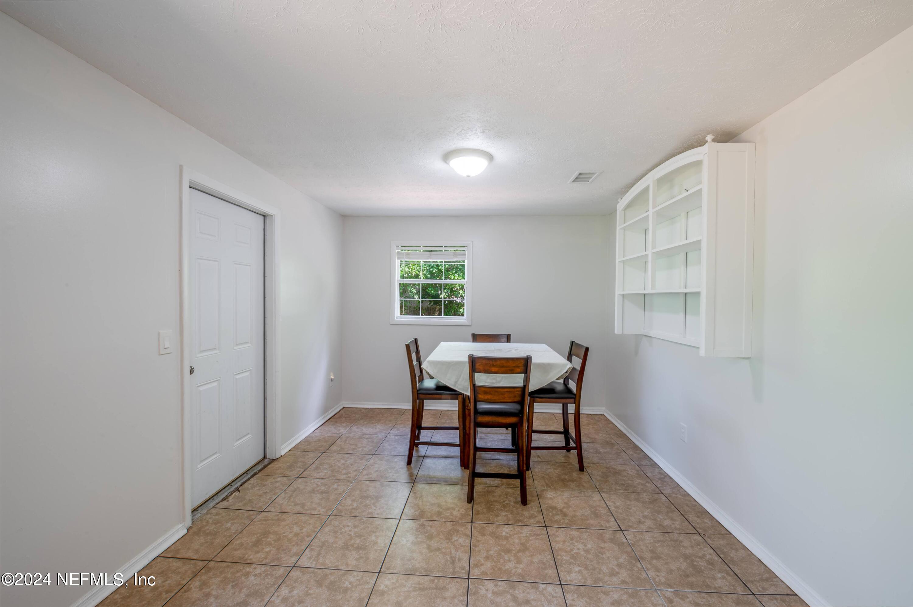 351 Capella Road Orange Park, FL 32073 - Photo 12 of 26 2024_07_08 351 Capella Rd-049-dining roo