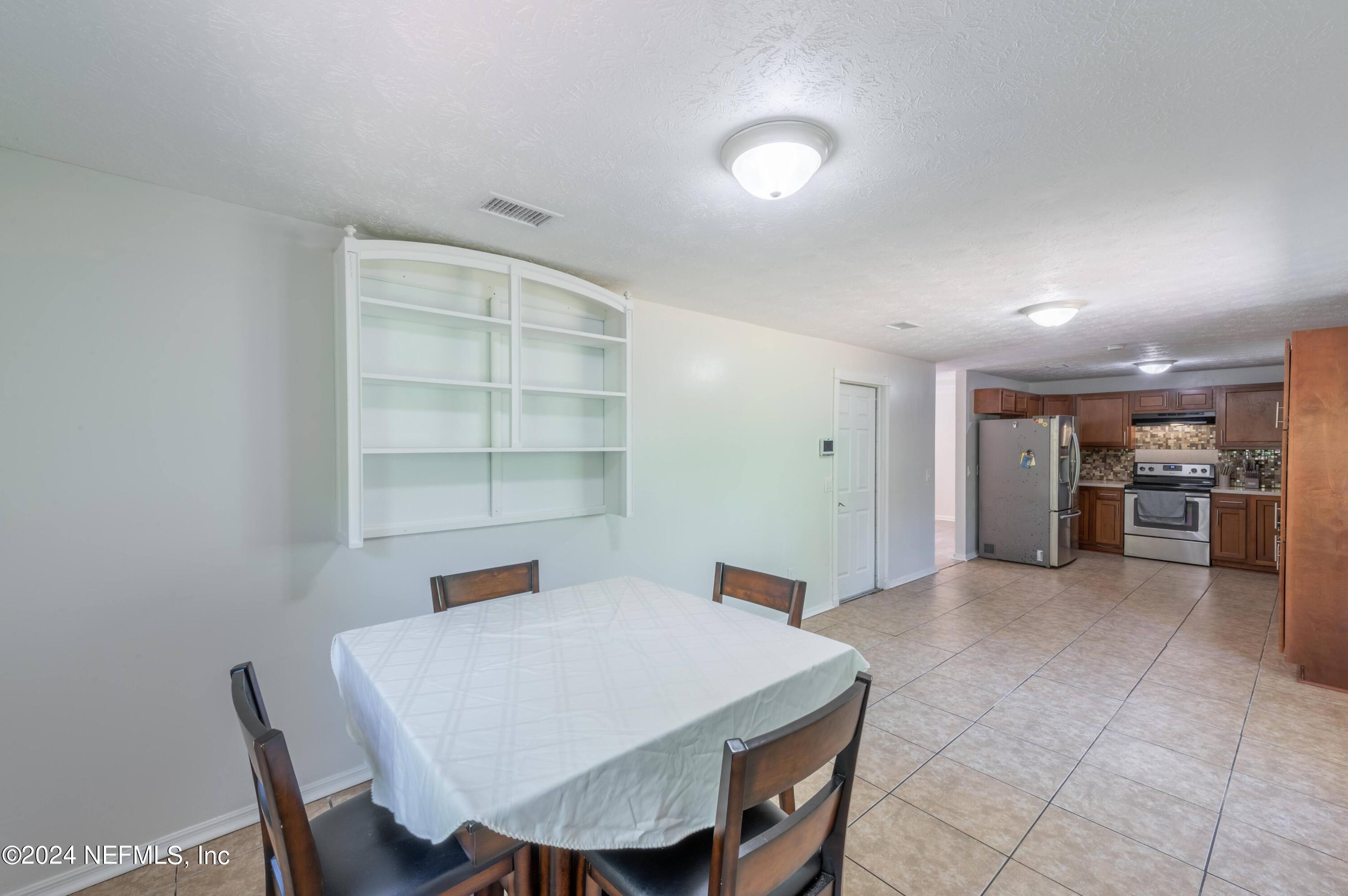 351 Capella Road Orange Park, FL 32073 - Photo 13 of 26 2024_07_08 351 Capella Rd-055-dining roo