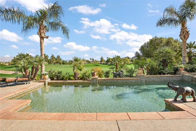 a view of a lake view with a garden