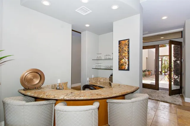 a view of a kitchen with washer and dryer