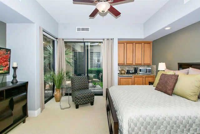a bathroom with a sink double vanity and a mirror