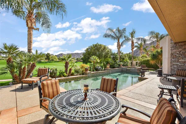 a view of a house with swimming pool