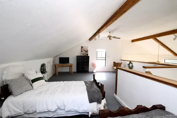 a view of a livingroom with furniture
