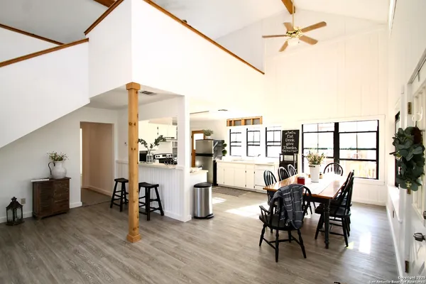 a kitchen with a sink stove and refrigerator