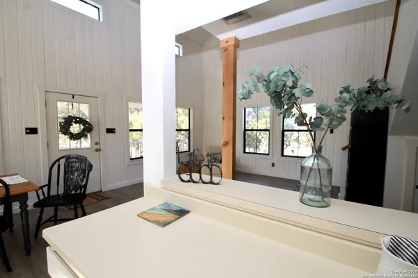 a view of a dining room with furniture window and outside view