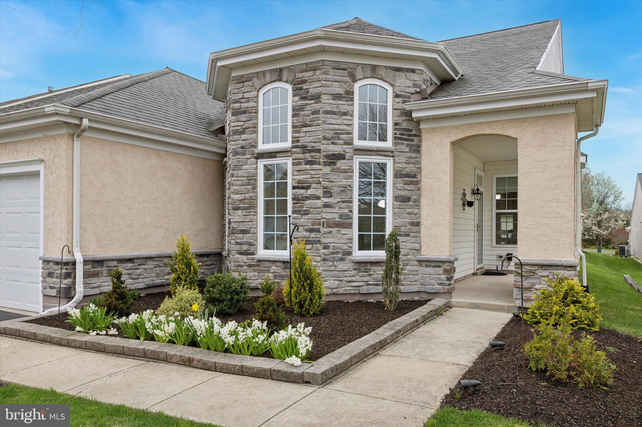 1105 Maxwell Manor Warminster, PA 18974 - Photo 2 of 15 a front view of a house with garden