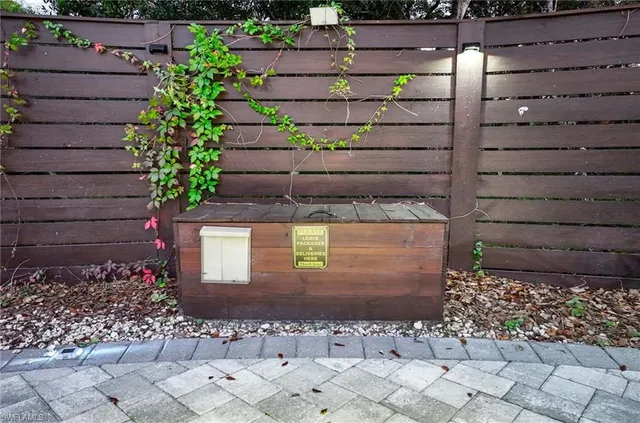 a view of a garden with an outdoor seating