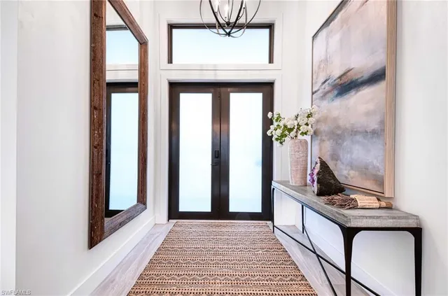 a view of an entryway with a front door