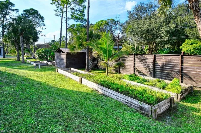 a view of a backyard with a garden