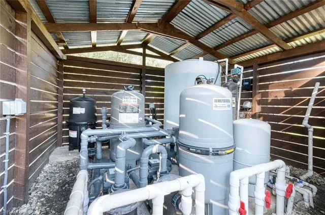 a bathroom with toilet and shower