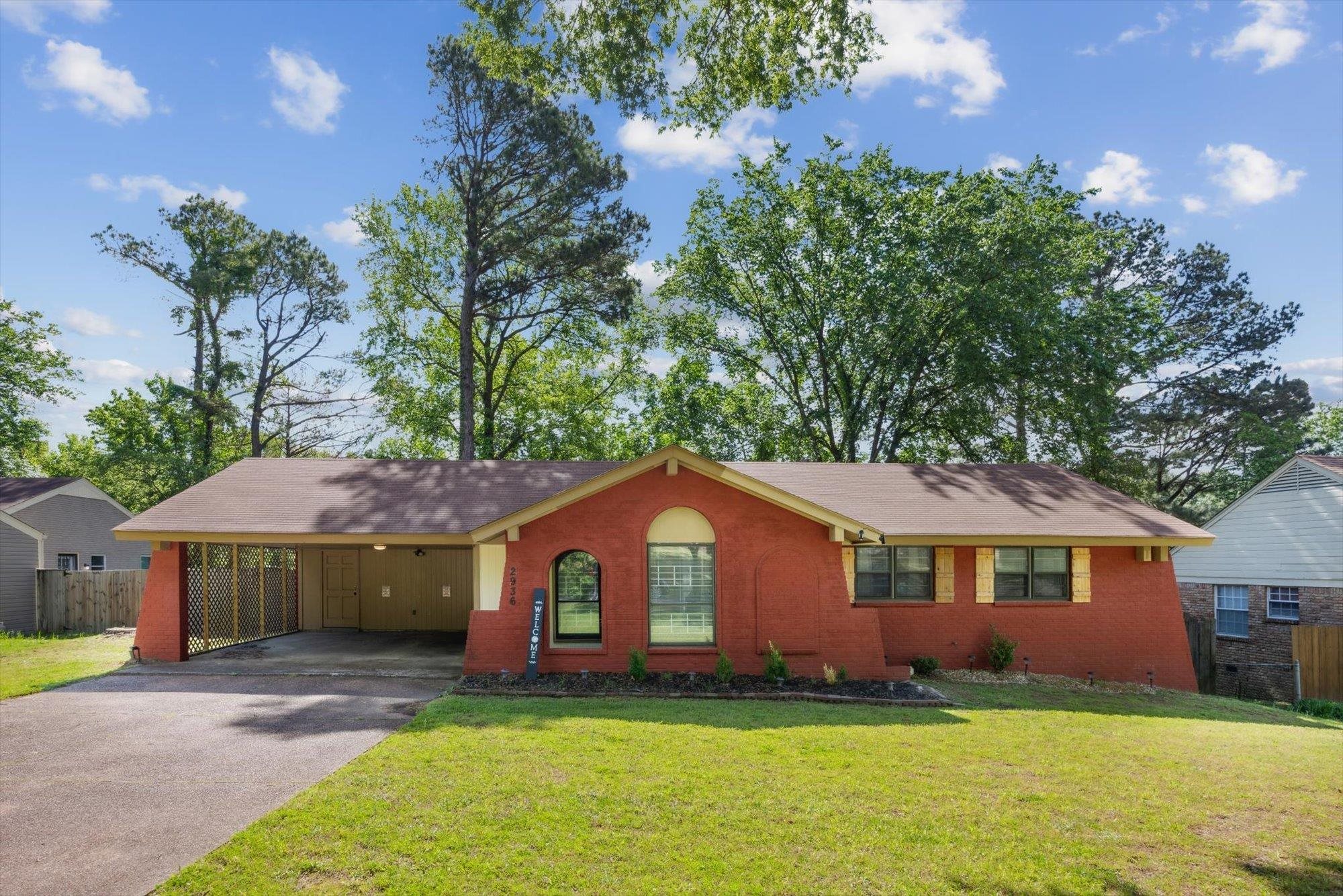 2936 Falkirk Road Memphis, TN 38128 - Photo 1 of 25 a front view of a house with a yard