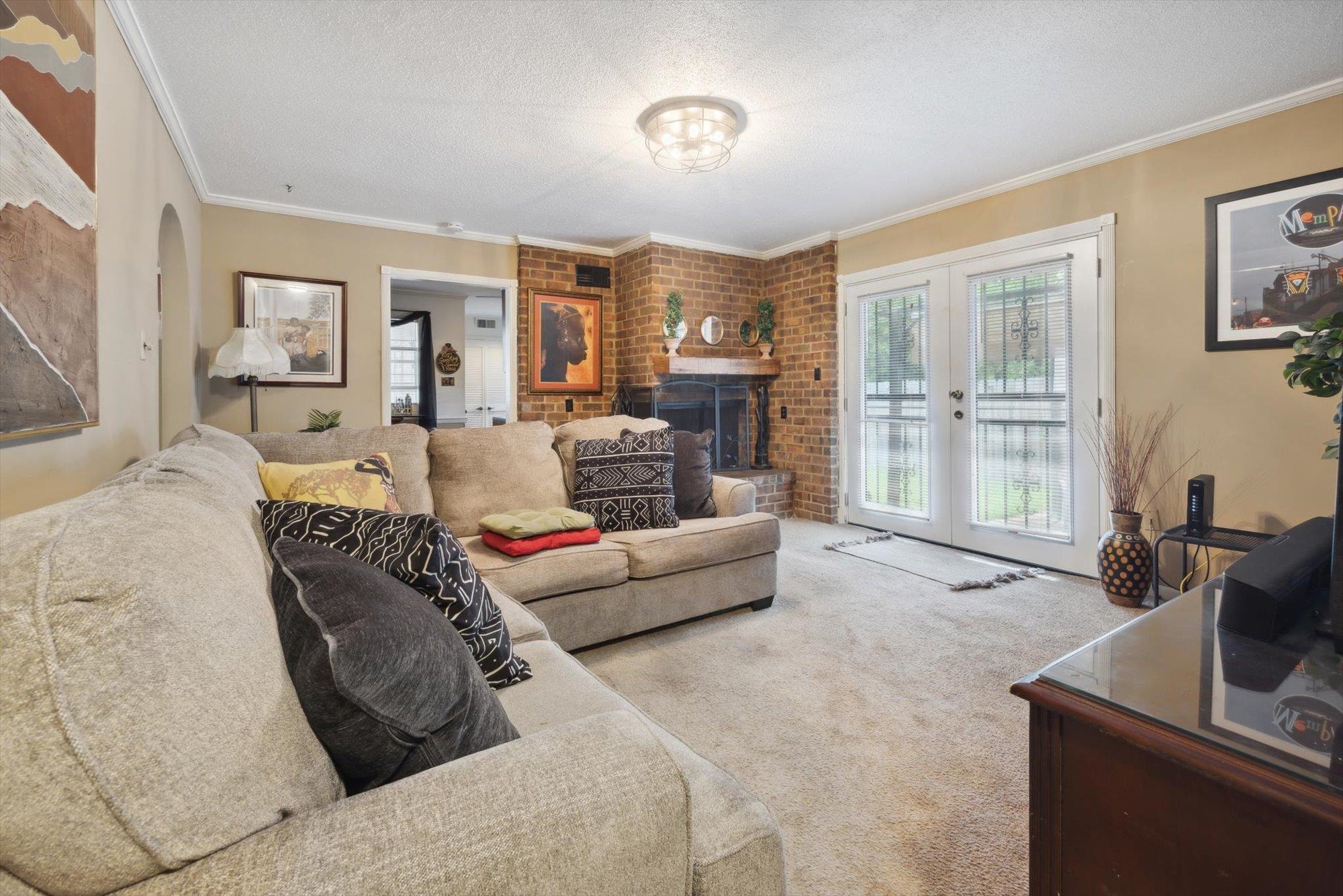 2936 Falkirk Road Memphis, TN 38128 - Photo 13 of 25 a living room with furniture and a large window