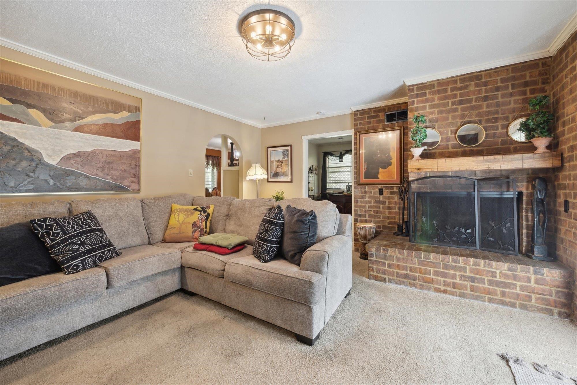 2936 Falkirk Road Memphis, TN 38128 - Photo 14 of 25 a living room with furniture and a fireplace
