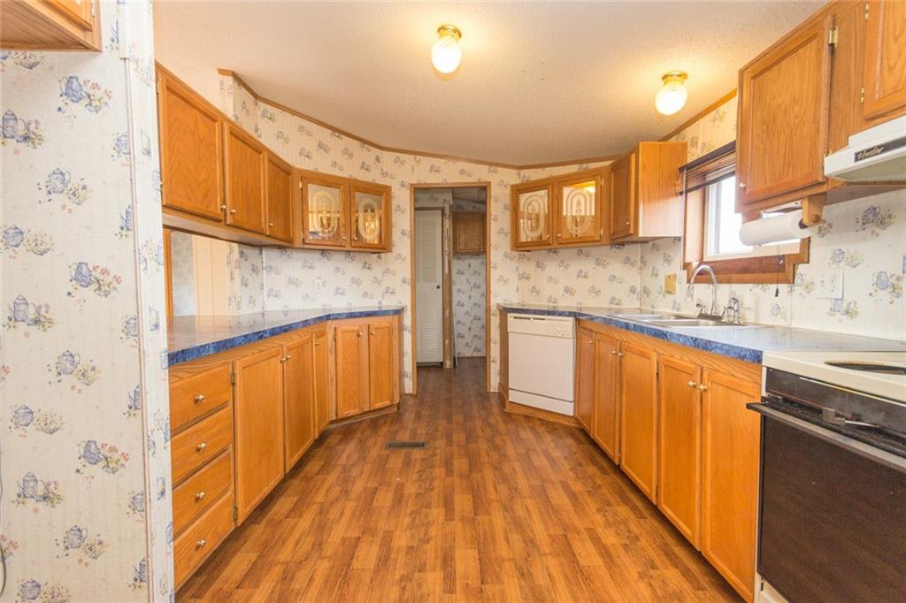 951 Achortown Road Beaver Falls, PA 15010 - Photo 9 of 21 Storage and counter space are plenty in the kitchen.