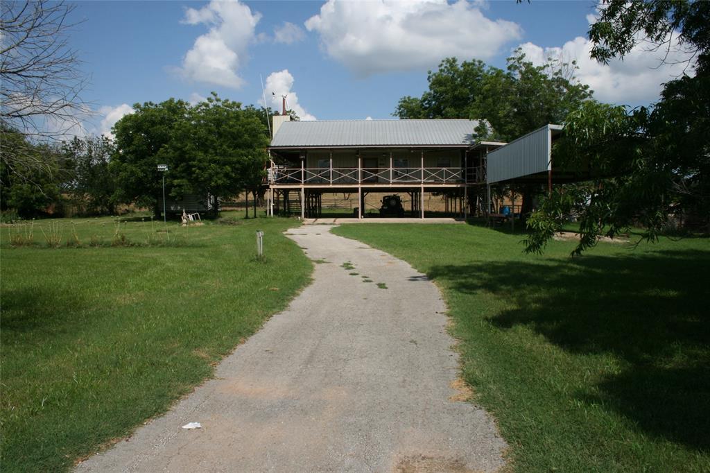 430 Rio Road Millsap, TX 76066 - Photo 25 of 25 View of front of house with a front lawn