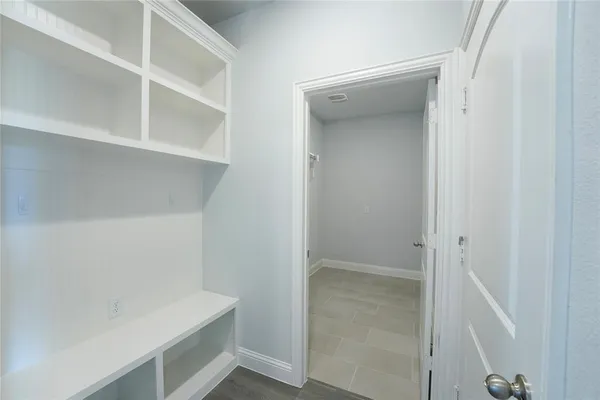 a view of an empty walk in closet