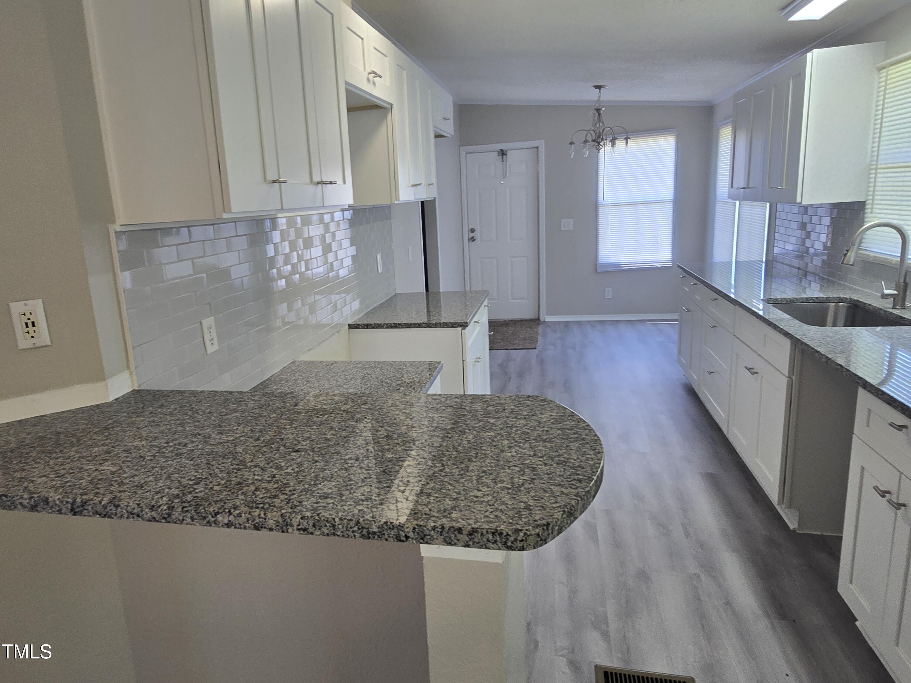 4817 Lobelia Road Vass, NC 28394 - Photo 12 of 35 From Dinning room looking into Kitchen