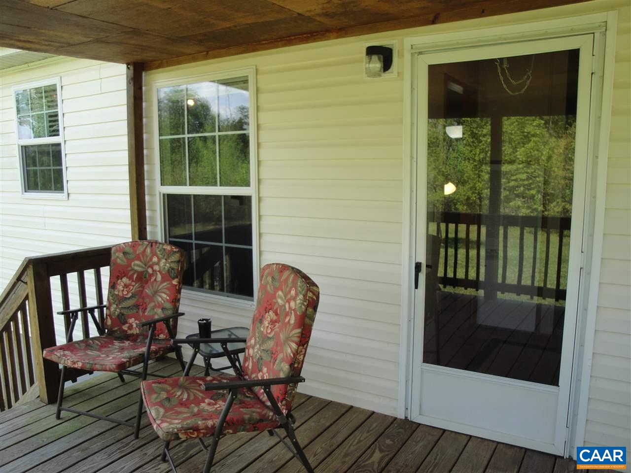 2748 Stage Coach Road Farmville, VA 23901 - Photo 3 of 42 a view of a chair and table in the balcony