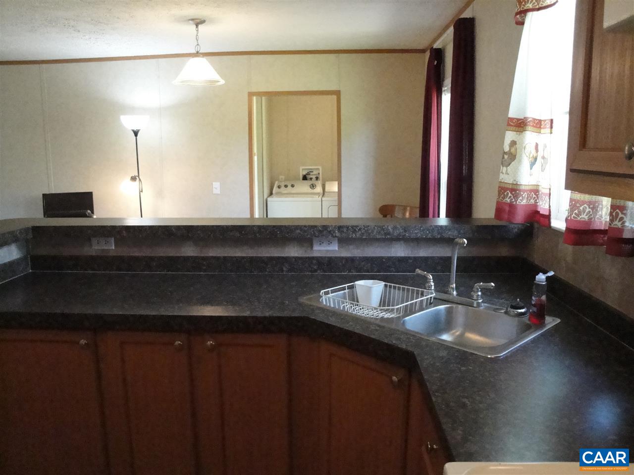 2748 Stage Coach Road Farmville, VA 23901 - Photo 6 of 42 a bathroom with a sink and a mirror