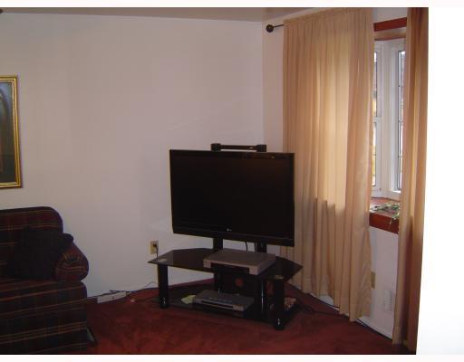5010 Windriver Drive McKees Rocks, PA 15136 - Photo 2 of 11 Living Room. Nicely sized living room with a bay window trimmed with wood