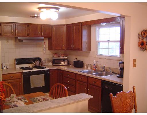 5010 Windriver Drive McKees Rocks, PA 15136 - Photo 4 of 11 Kitchen. A warm, eat-in kitchen with plenty of cabinet space