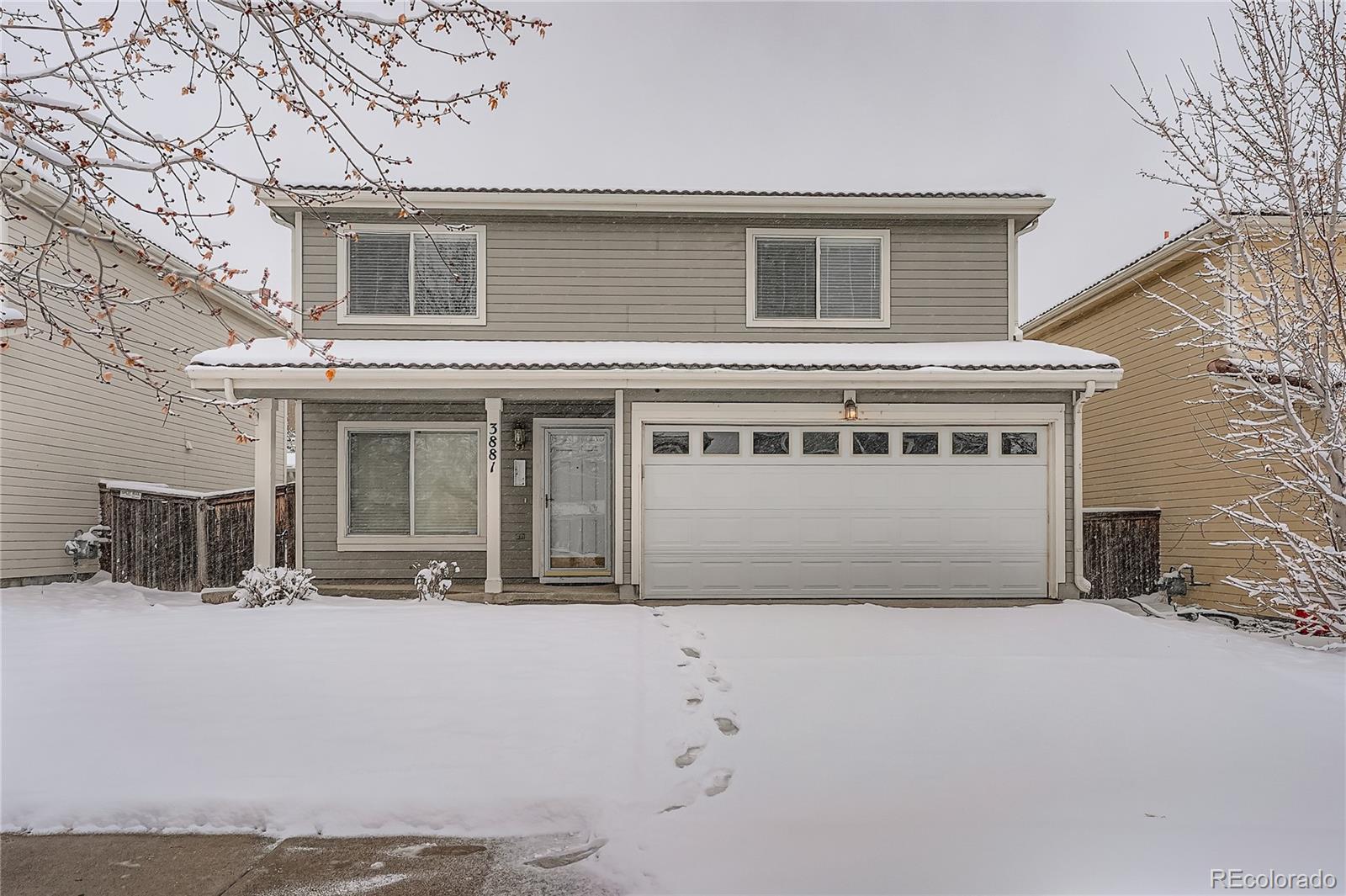 front view of house with a yard