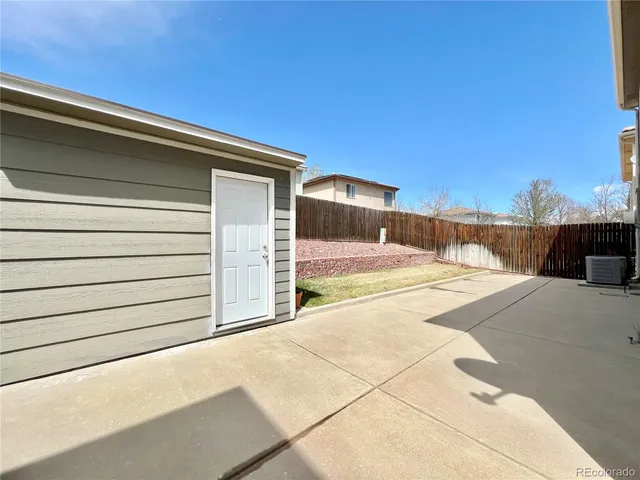 a view of a backyard of a house