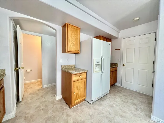 a view of kitchen and utility room