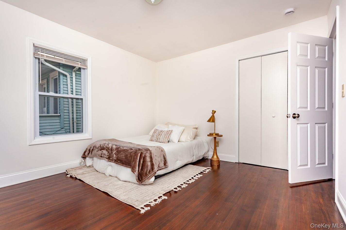 89 Smith Street Poughkeepsie, NY 12601 - Photo 29 of 42 a living room with furniture and a window