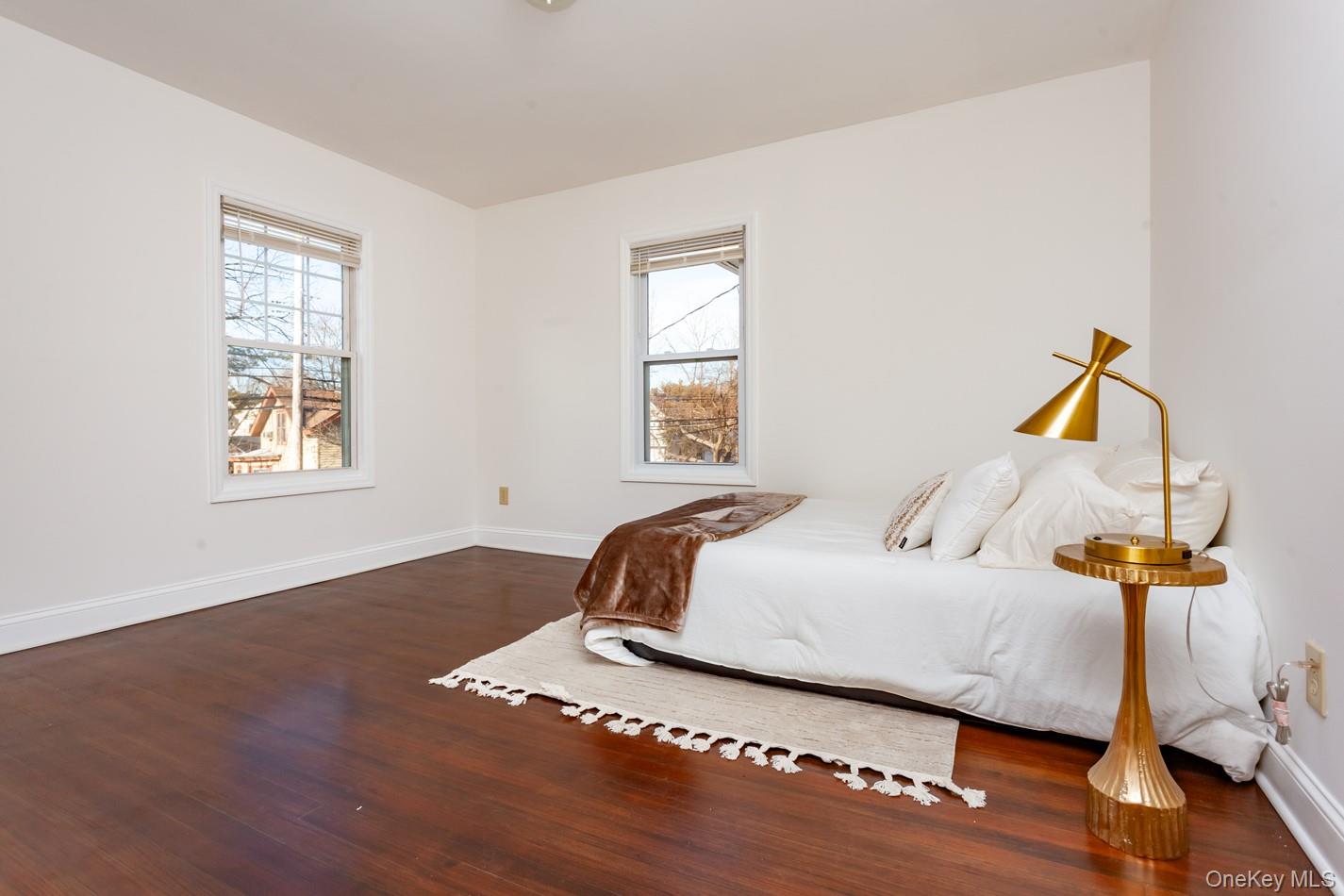 89 Smith Street Poughkeepsie, NY 12601 - Photo 30 of 42 a bedroom with bed and window