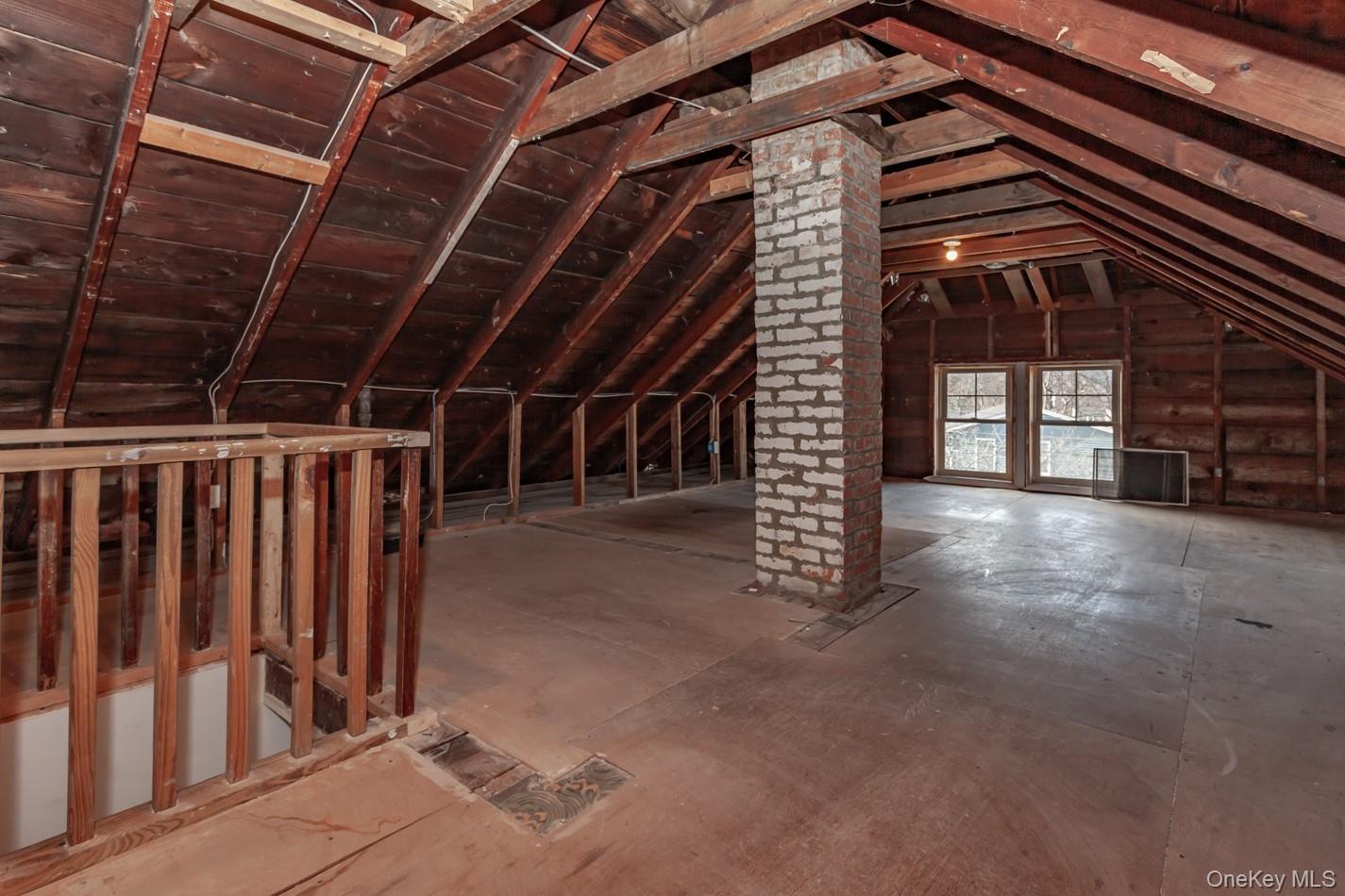 89 Smith Street Poughkeepsie, NY 12601 - Photo 31 of 42 a view of an empty room with wooden walls