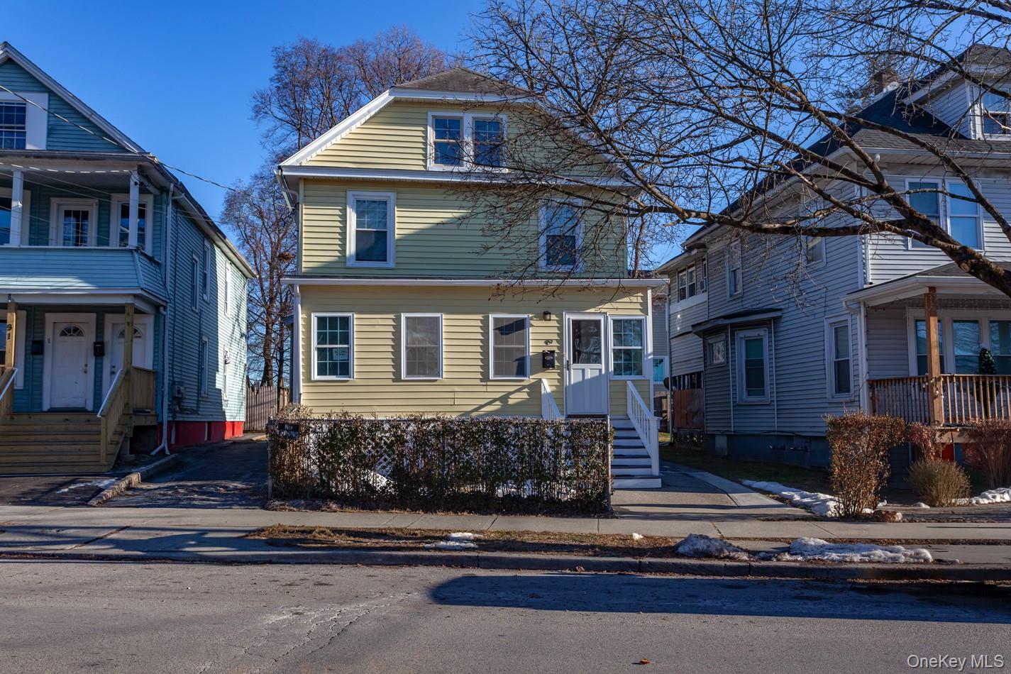 89 Smith Street Poughkeepsie, NY 12601 - Photo 36 of 42 a front view of a house with a yard