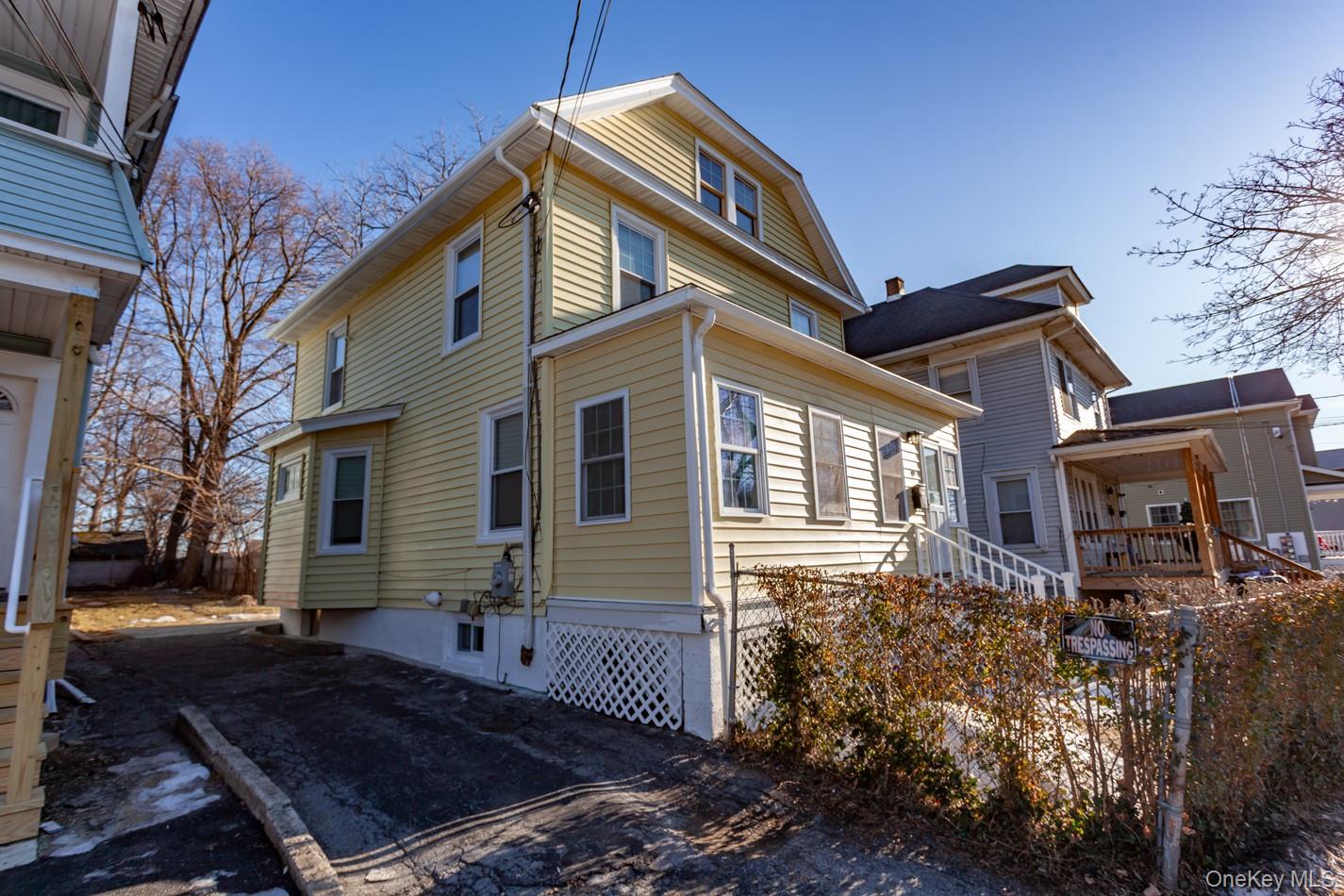 89 Smith Street Poughkeepsie, NY 12601 - Photo 37 of 42 a view of a house with a yard
