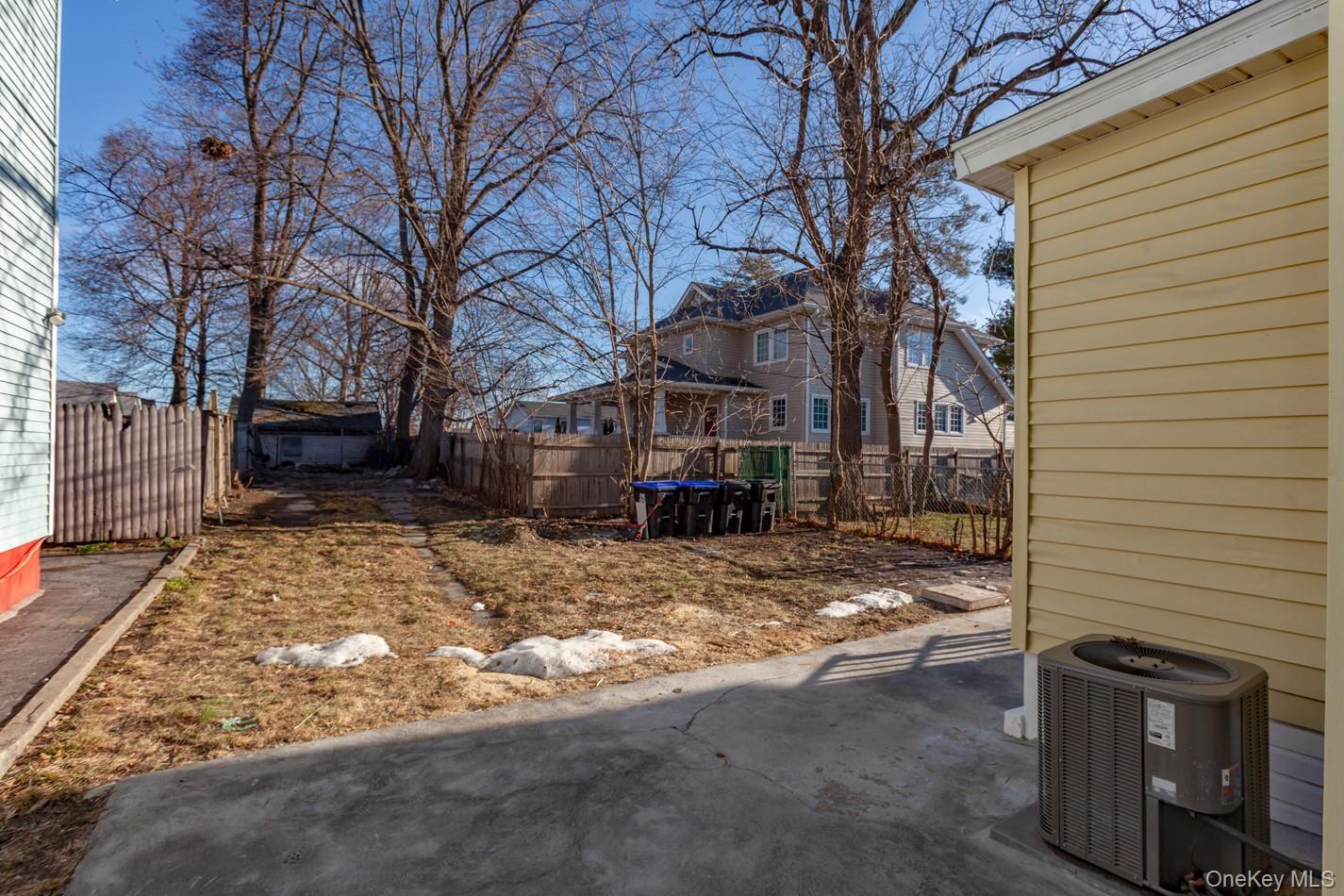 89 Smith Street Poughkeepsie, NY 12601 - Photo 38 of 42 a view of a yard with a tree