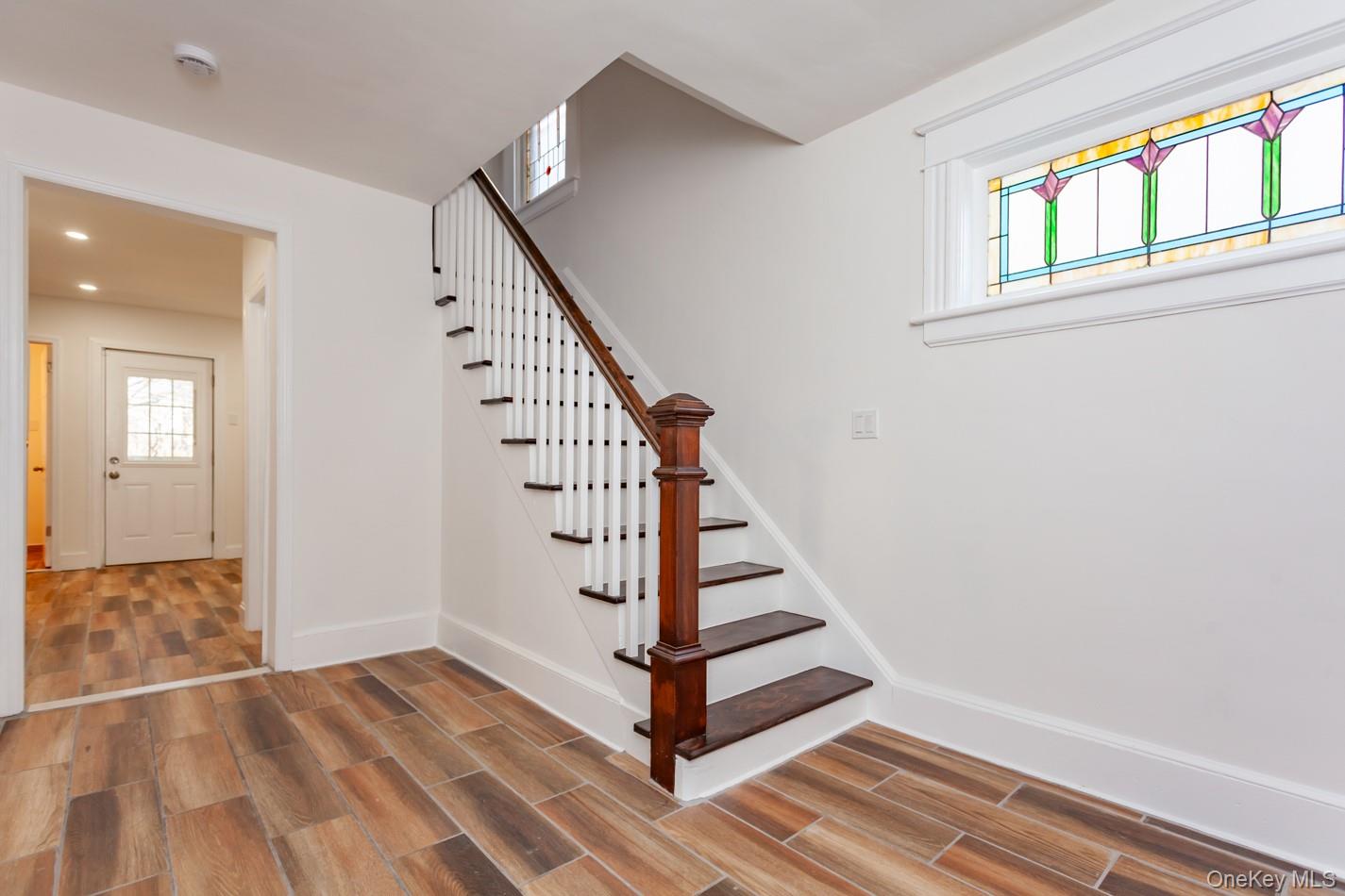 89 Smith Street Poughkeepsie, NY 12601 - Photo 5 of 42 a view of entryway and hall with wooden floor