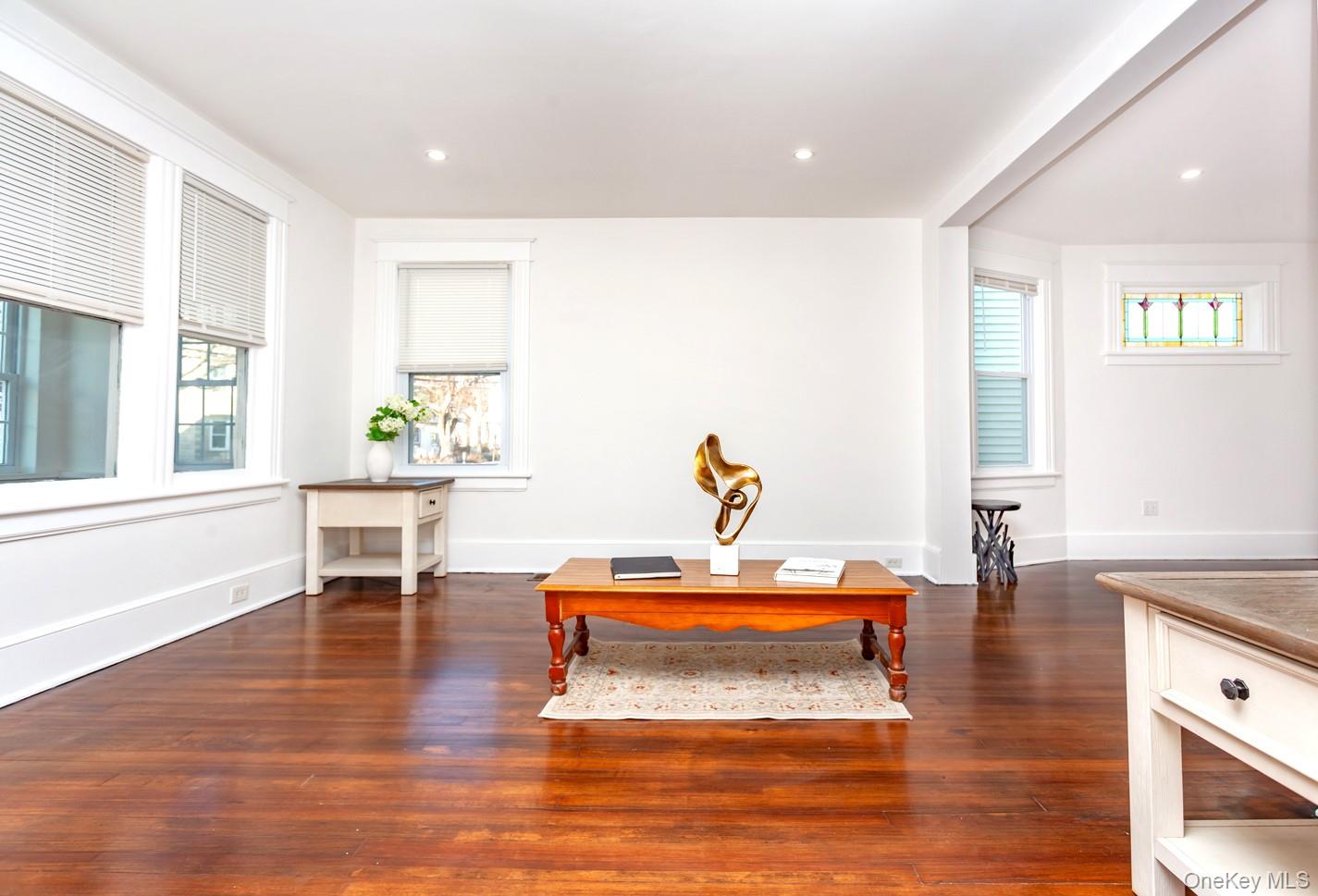 89 Smith Street Poughkeepsie, NY 12601 - Photo 8 of 42 a living room with furniture and wooden floor