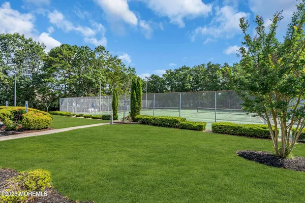 a view of backyard with green space