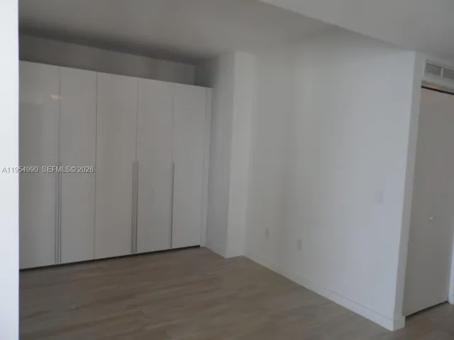 a view of hallway with natural light