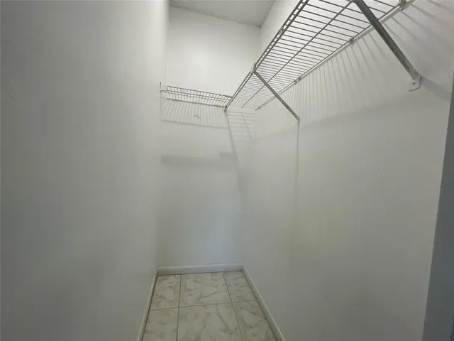 a view of small space with racks on the wall