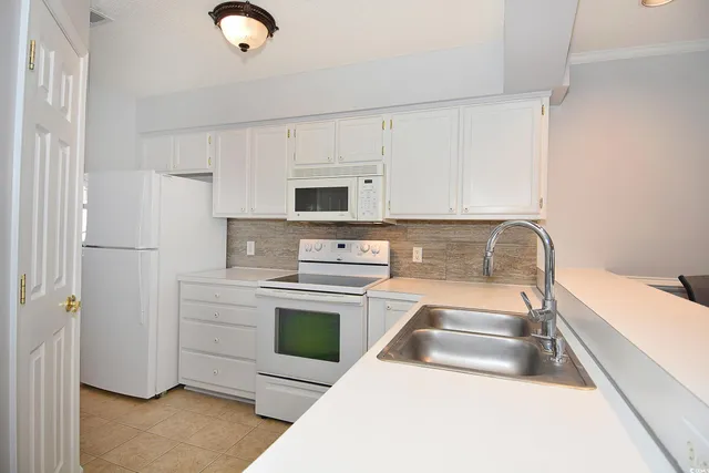 $249,900 | 4622 Greenbriar Drive, Unit G7, Little River, SC 29566