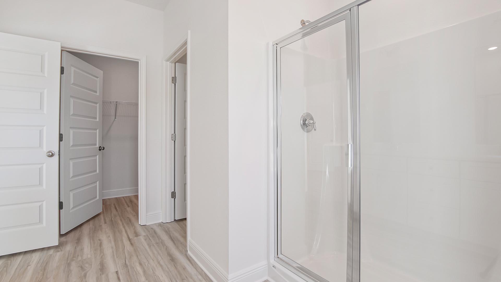 373 Holley Grv Lane Santa Rosa Beach, FL 32459 - Photo 27 of 46 a view of a hallway with wooden floor