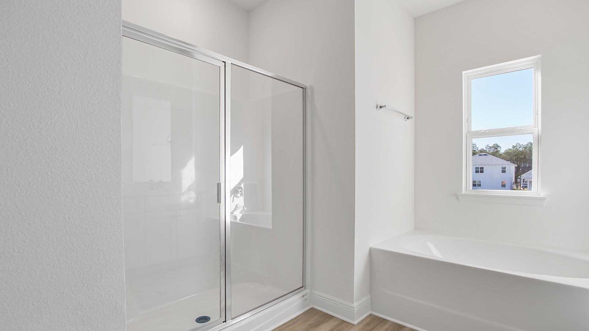 373 Holley Grv Lane Santa Rosa Beach, FL 32459 - Photo 29 of 46 a bathroom with a bathtub