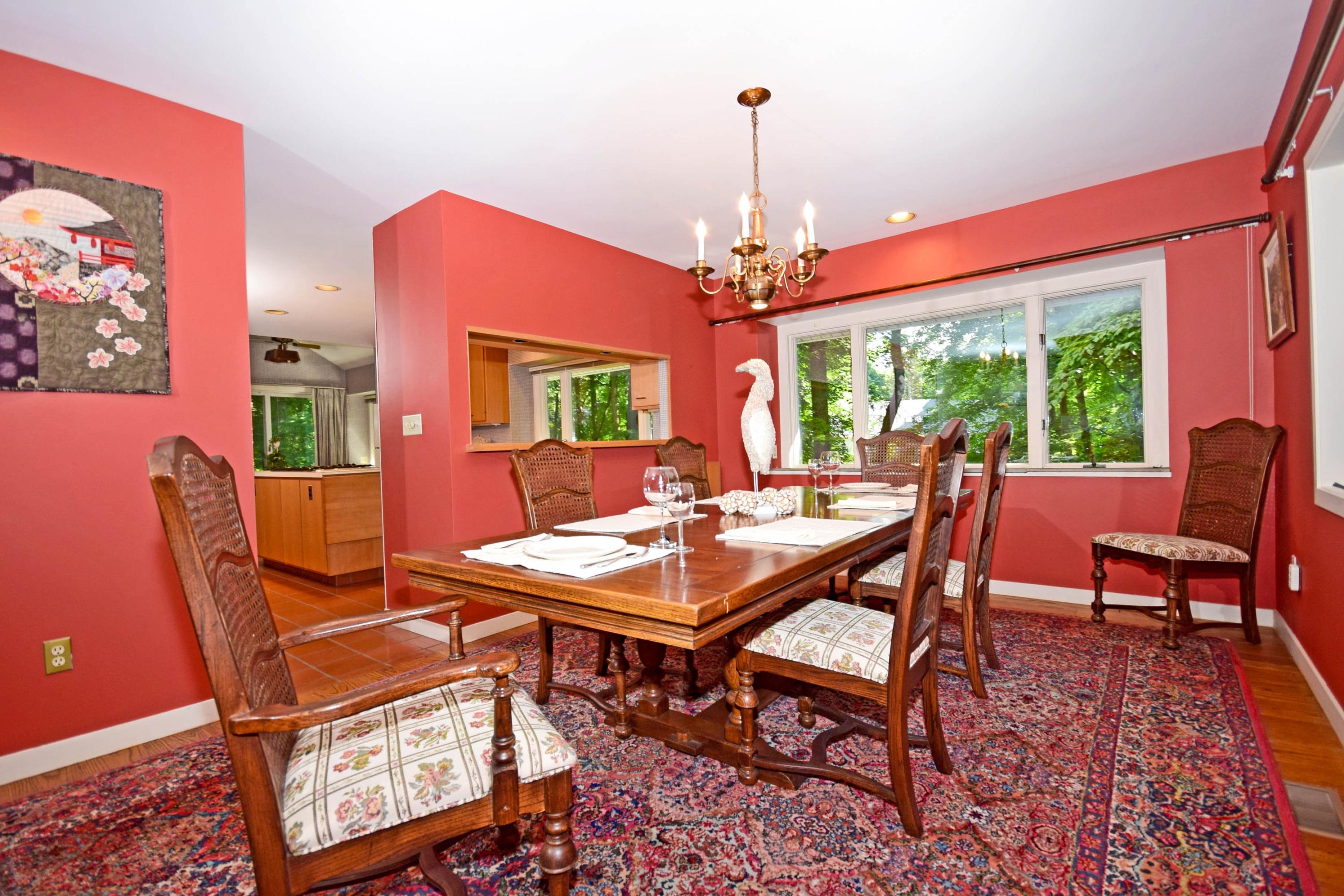 11 Wildcat Road Darien, CT 06820 - Photo 11 of 25 a view of a dining room with furniture window and wooden floor