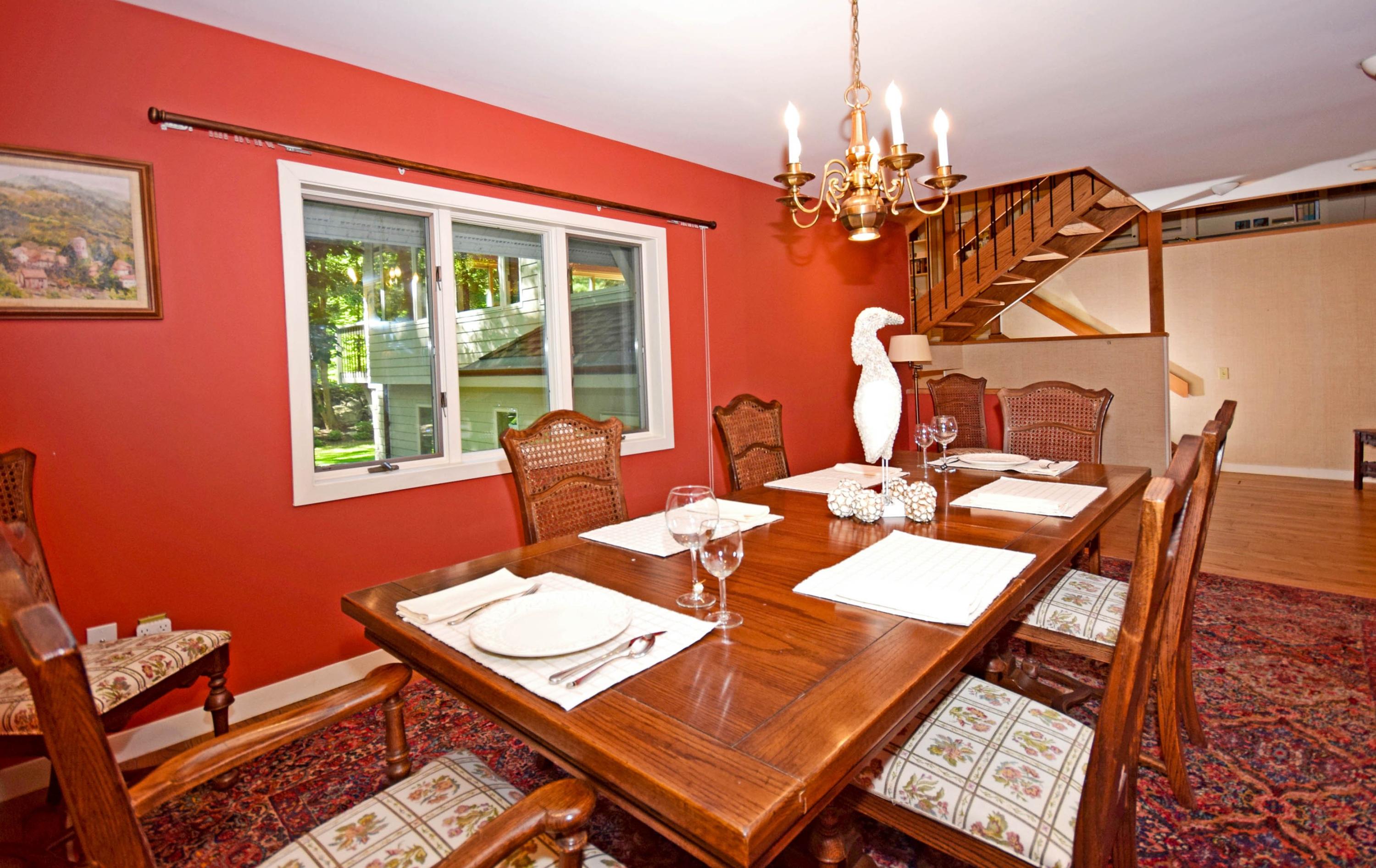 11 Wildcat Road Darien, CT 06820 - Photo 12 of 25 a view of a dining room with furniture and chandelier